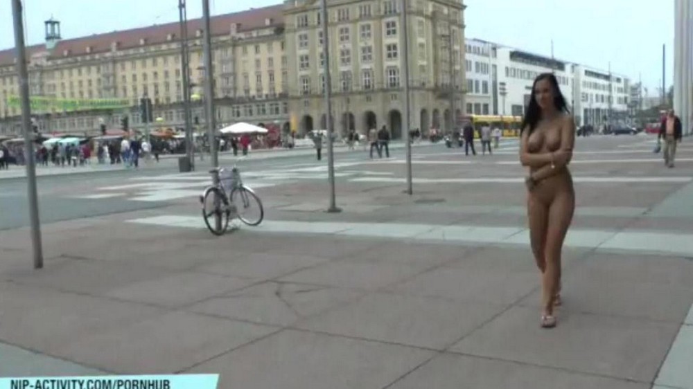 Naked chick walks through the streets of the city - porn video  