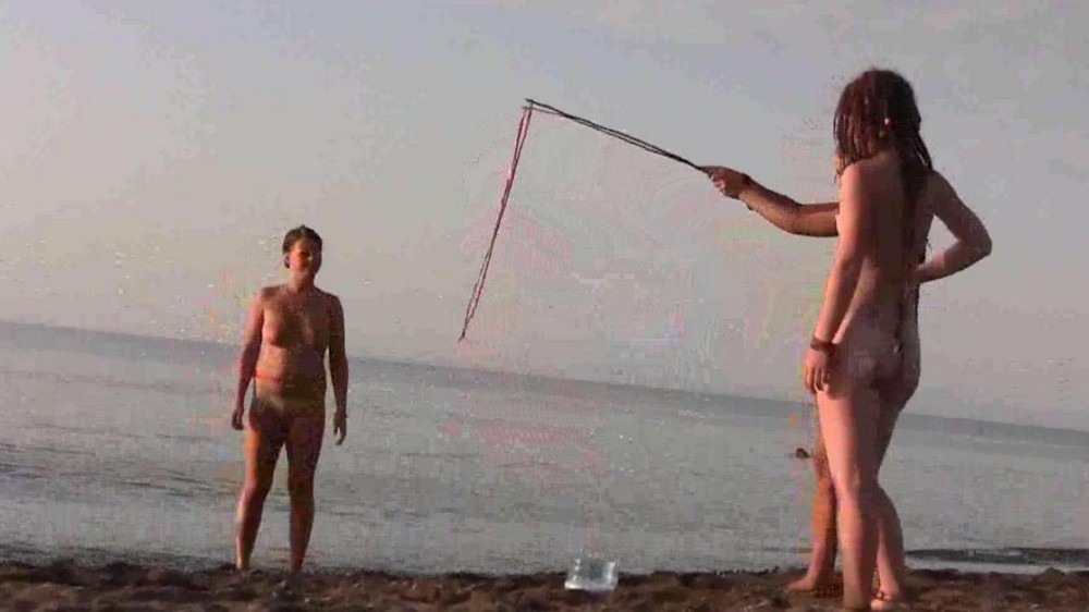 Naked playing on the beach - porn video  