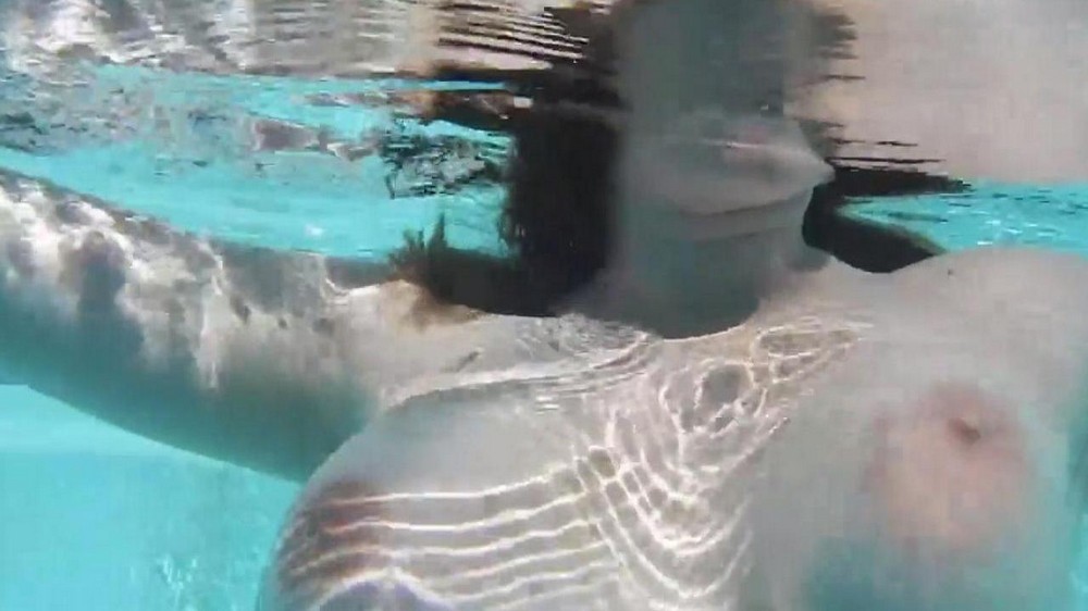 Masturbates with a dildo in the pool - porn video  