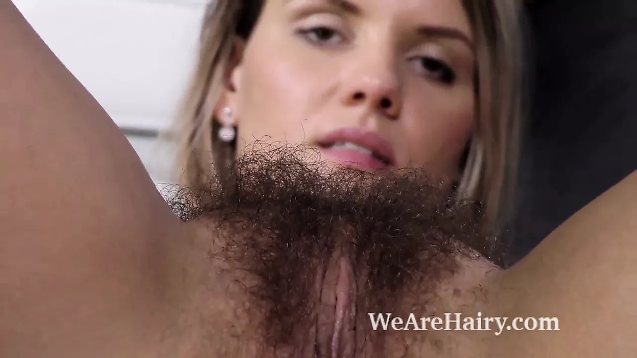 Jehanna strips naked and fingers her hairy pussy - porn video  